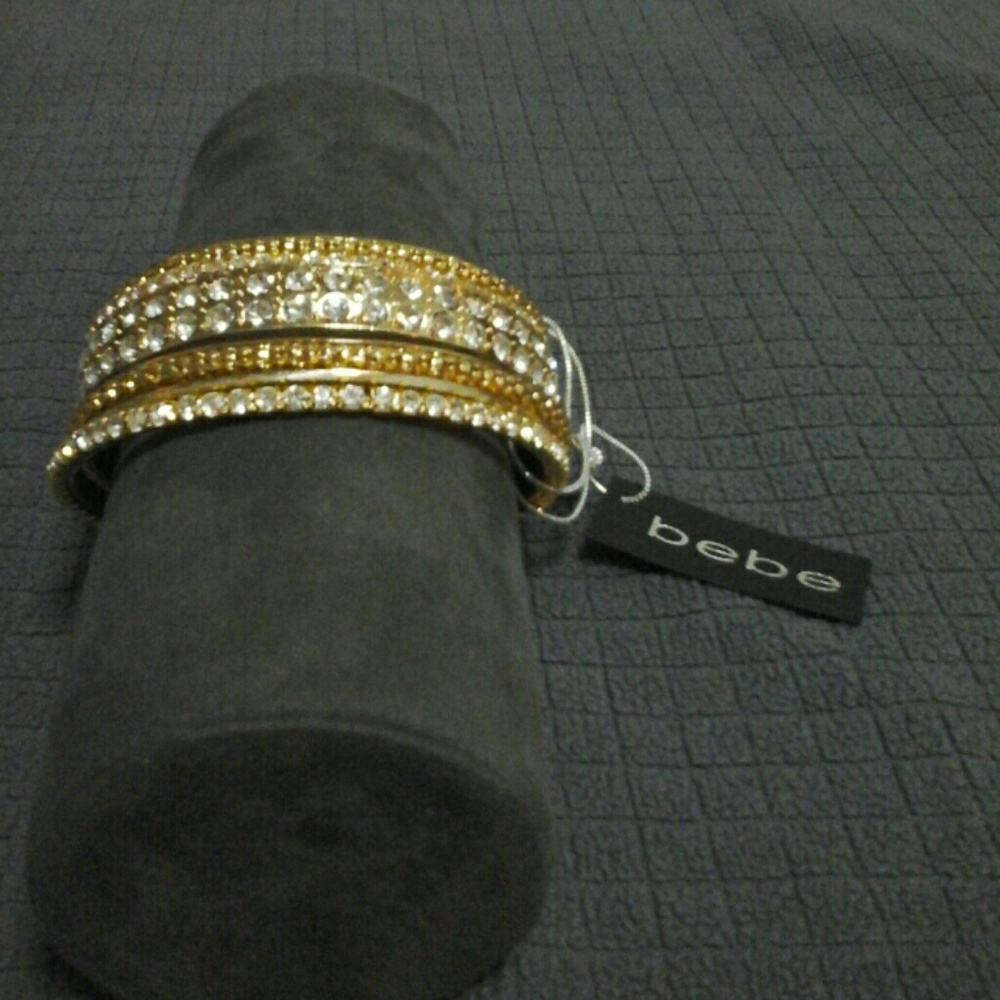 BEBÉ GOLDEN RHINESTONE PRINCESS BANGLES.